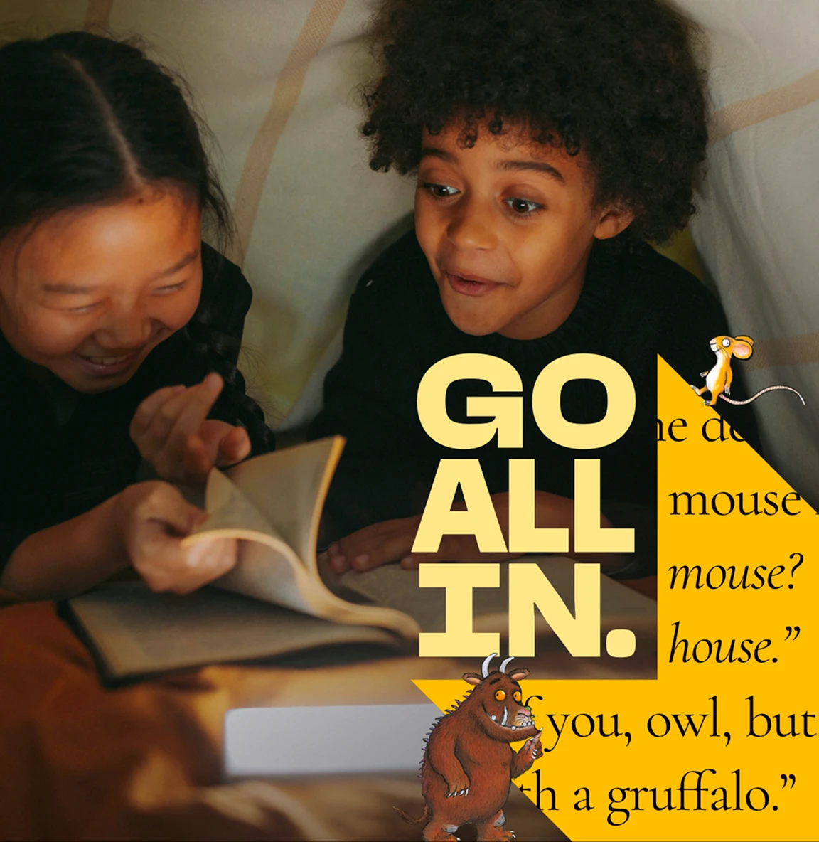 Two children reading together with “Go All In” campaign text overlaid