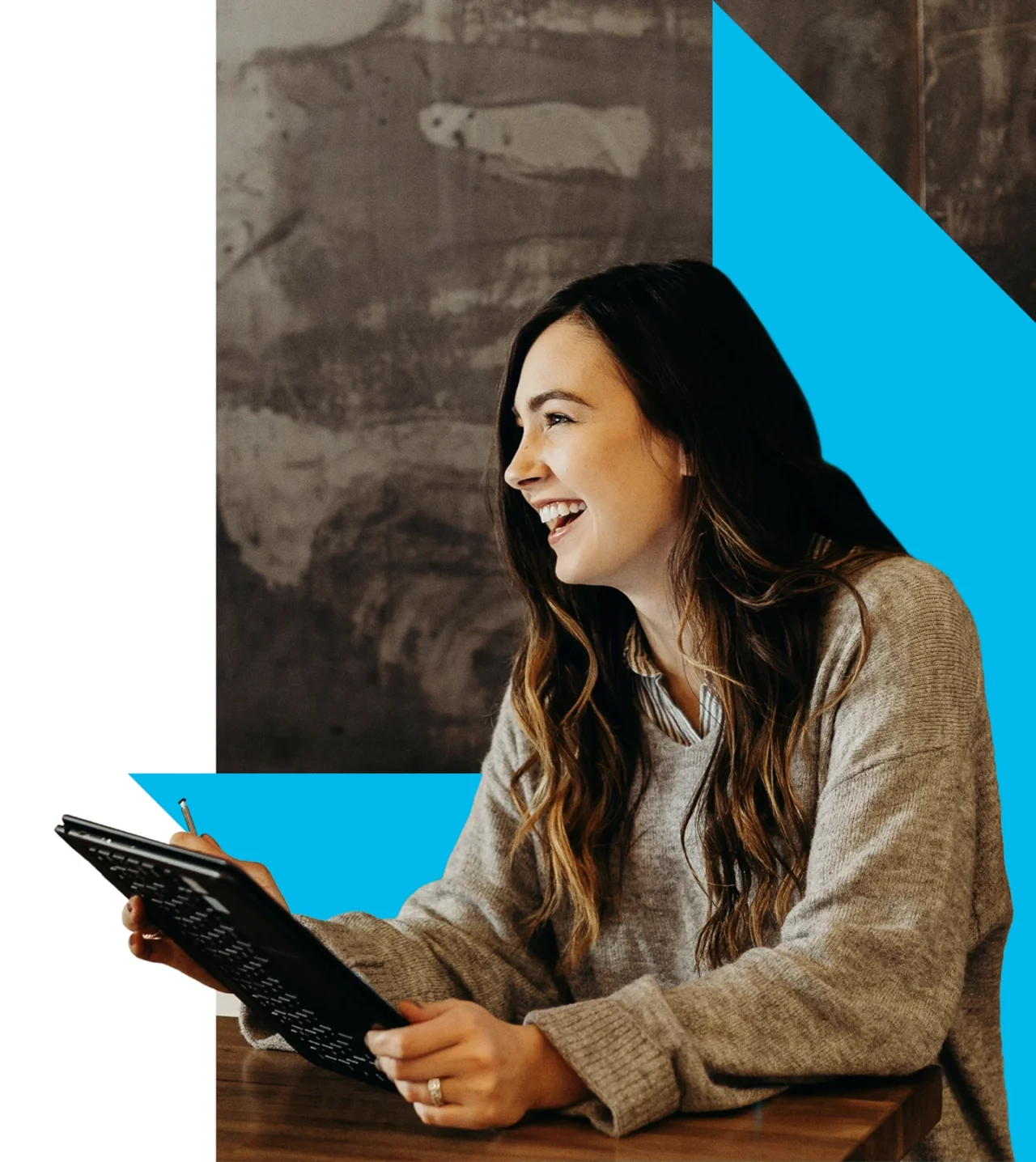 Adult holding and reading from a tablet device