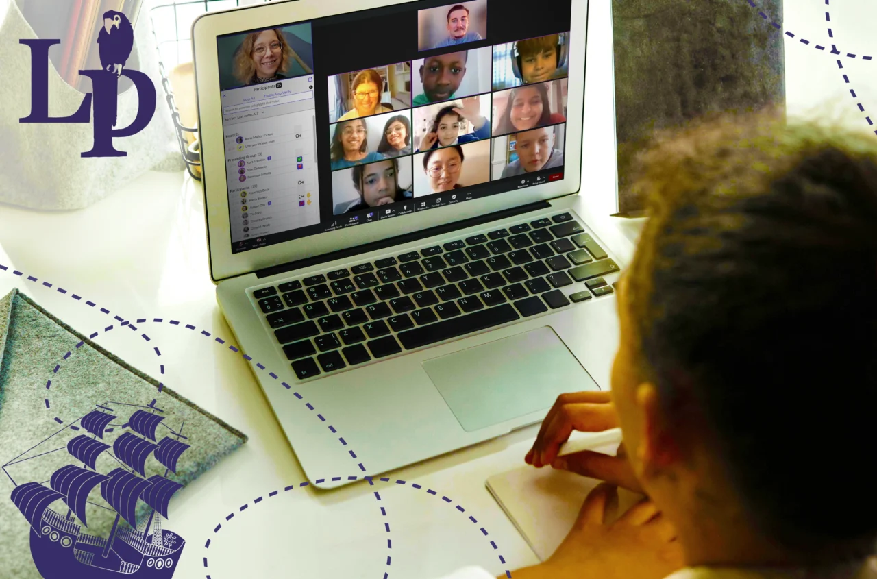 Laptop screen showing a video call with multiple participants