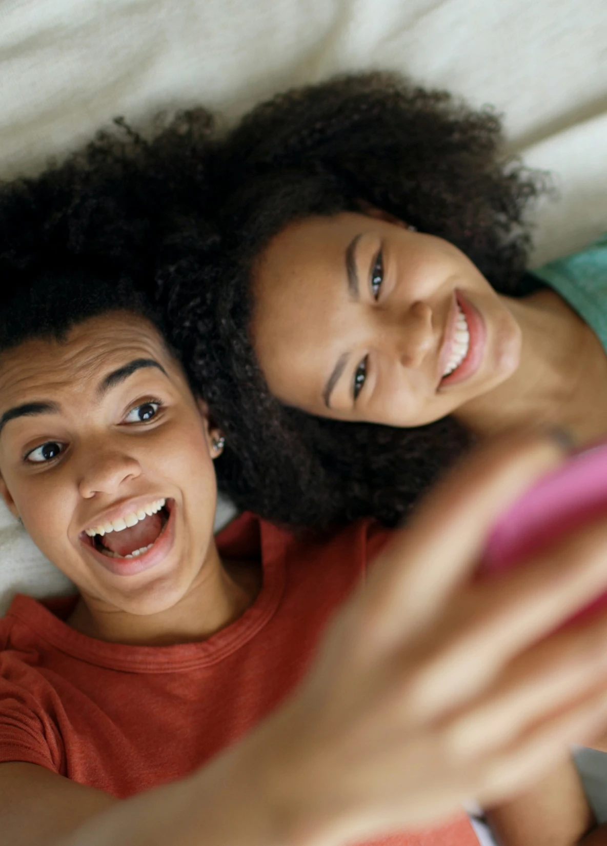 Teenage girls taking a selfie